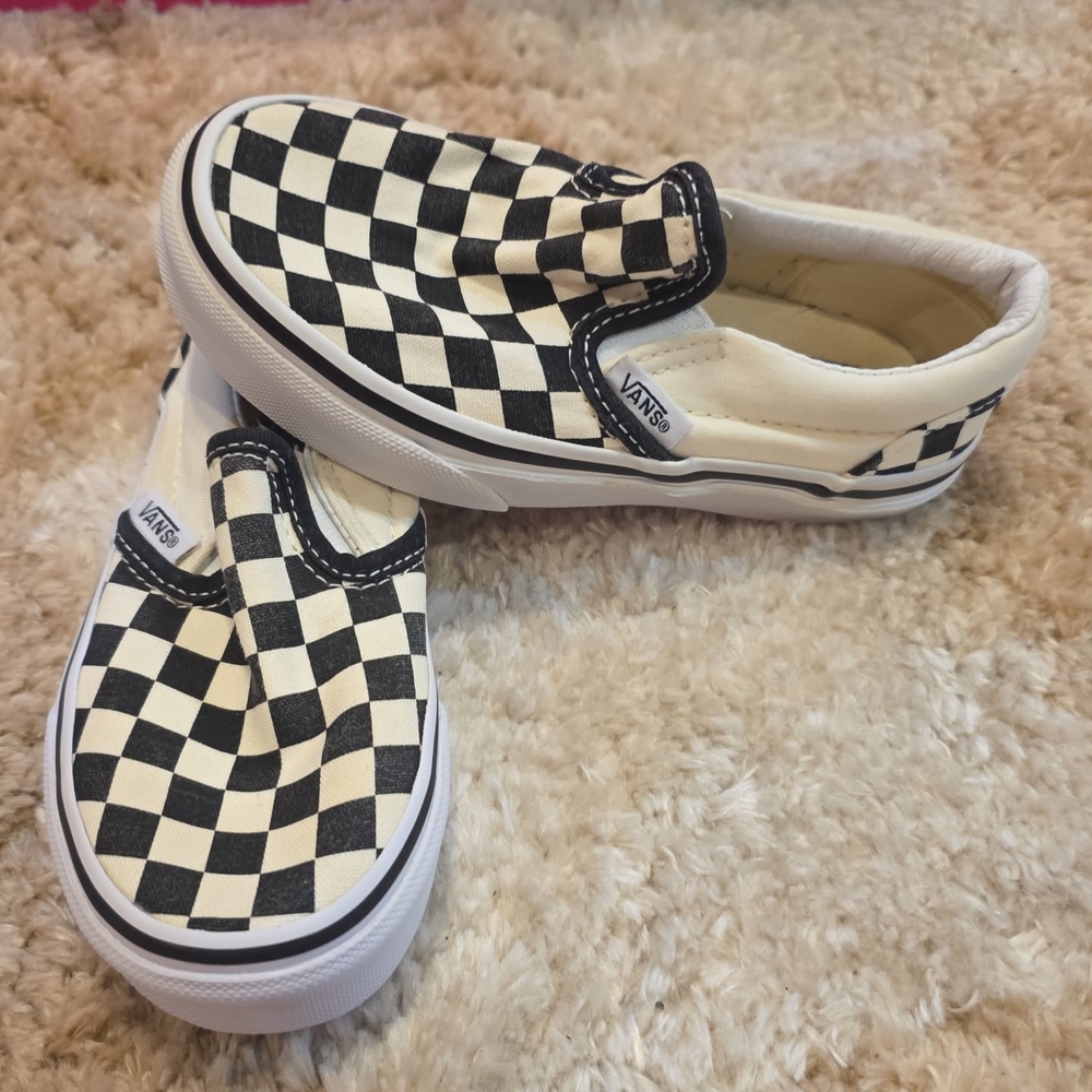 Vans Black and White Checkerboard Slip-On Sneakers
